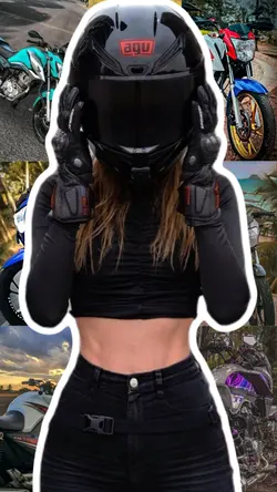 Moça equipada para pilotar motocicleta